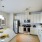 Large kitchen with island and white cabinets