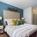 Bedroom with furniture and wall decor