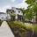 Building exterior with sidewalk and trees